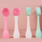 Four different heads of a facial cleansing brush on a pink background