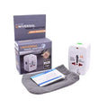 Universal travel adapter with packaging, adapter, and user manual on a white background