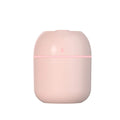 Pink air freshener with a light on a white background