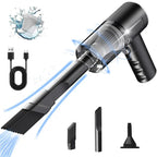 Handheld vacuum cleaner with attachments and USB cable on a white background