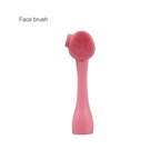 Pink face brush on a white background