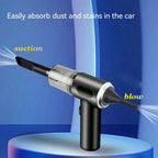 Handheld vacuum cleaner with suction and blow functions on a blue background