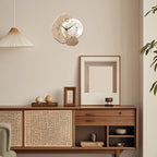 Wooden sideboard with decorative items against a beige wall