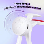 White handheld device with red nozzle and temperature control dial on a purple background