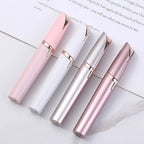 Four lip glosses in pink, white, and rose gold on a light surface with text in the background.