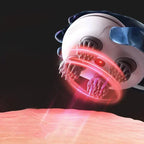 Massage device with red light on a black background