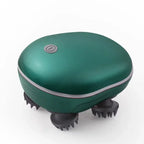 Green handheld massager with brush heads on a white background