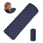 Blue inflatable sleeping pad with a person wearing a beanie in the corner on a white background