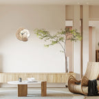 Modern living room with a wooden armchair, round table, and decorative clock.