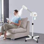 Woman sitting on a couch using a portable air purifier device.